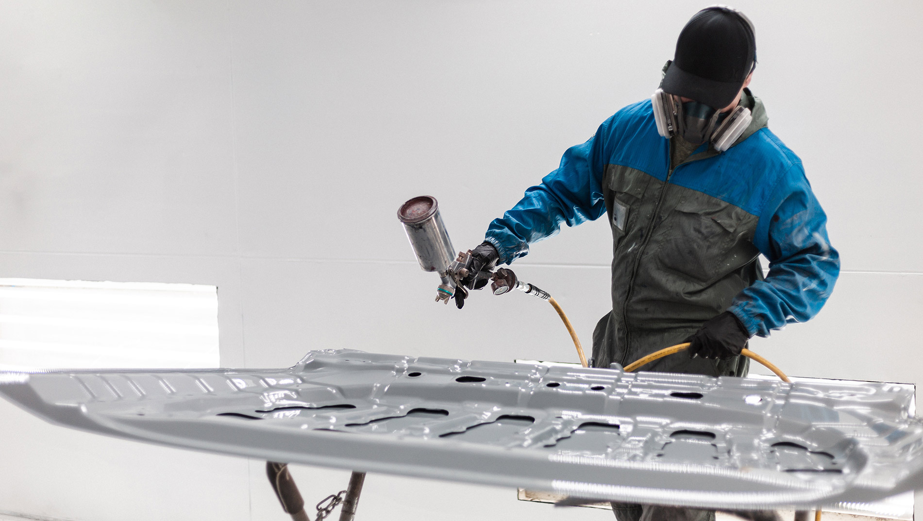 Man Spraying Hood